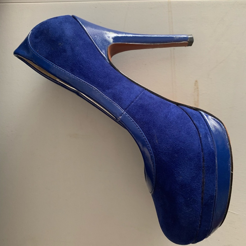 Gently worn XOXO platform heels